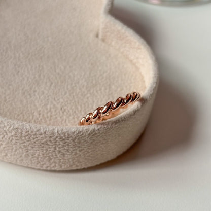 Gold Twist Ring in standing position photo