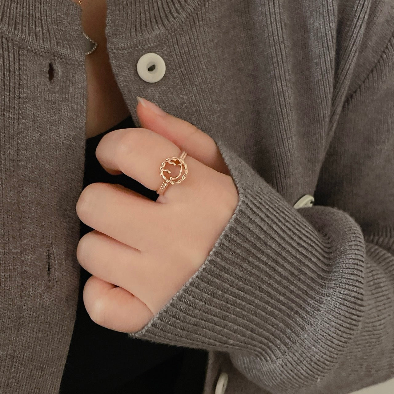 Happy Face Ring on a finger