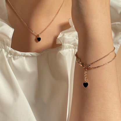 Onyx Heart Charm Bracelet